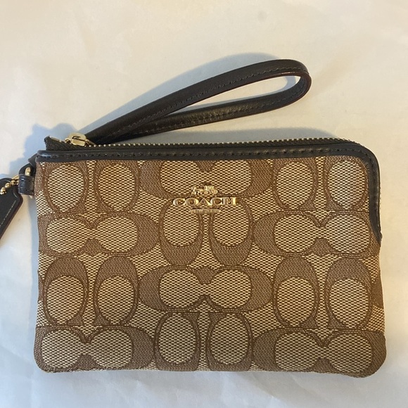 Coach Handbags - Coach Signature C Tan and Brown Wristlet Wallet